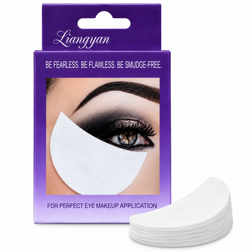 A stack of white crescent-shaped eye makeup remover pads shown in front of their purple retail packaging box, which features the brand name Liangyan.